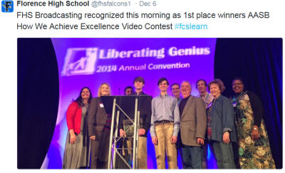 image of students being recognized with award